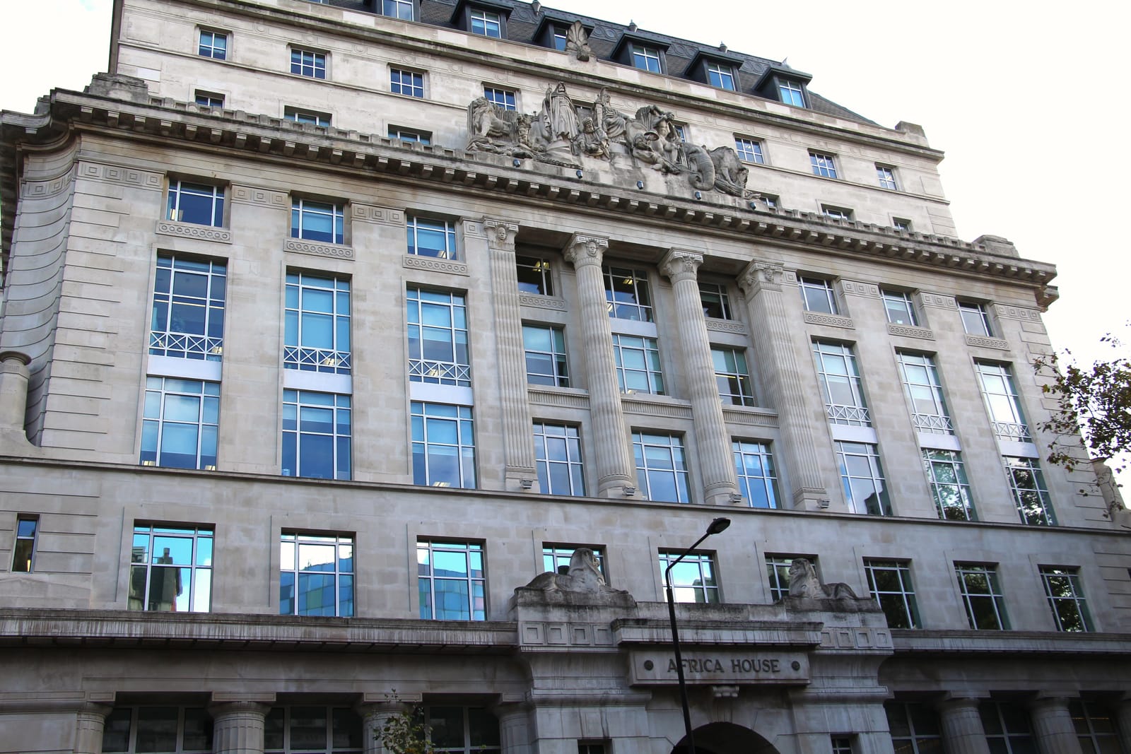 Africa House on Kingsway, with its stone name panel and sculpted cornice.