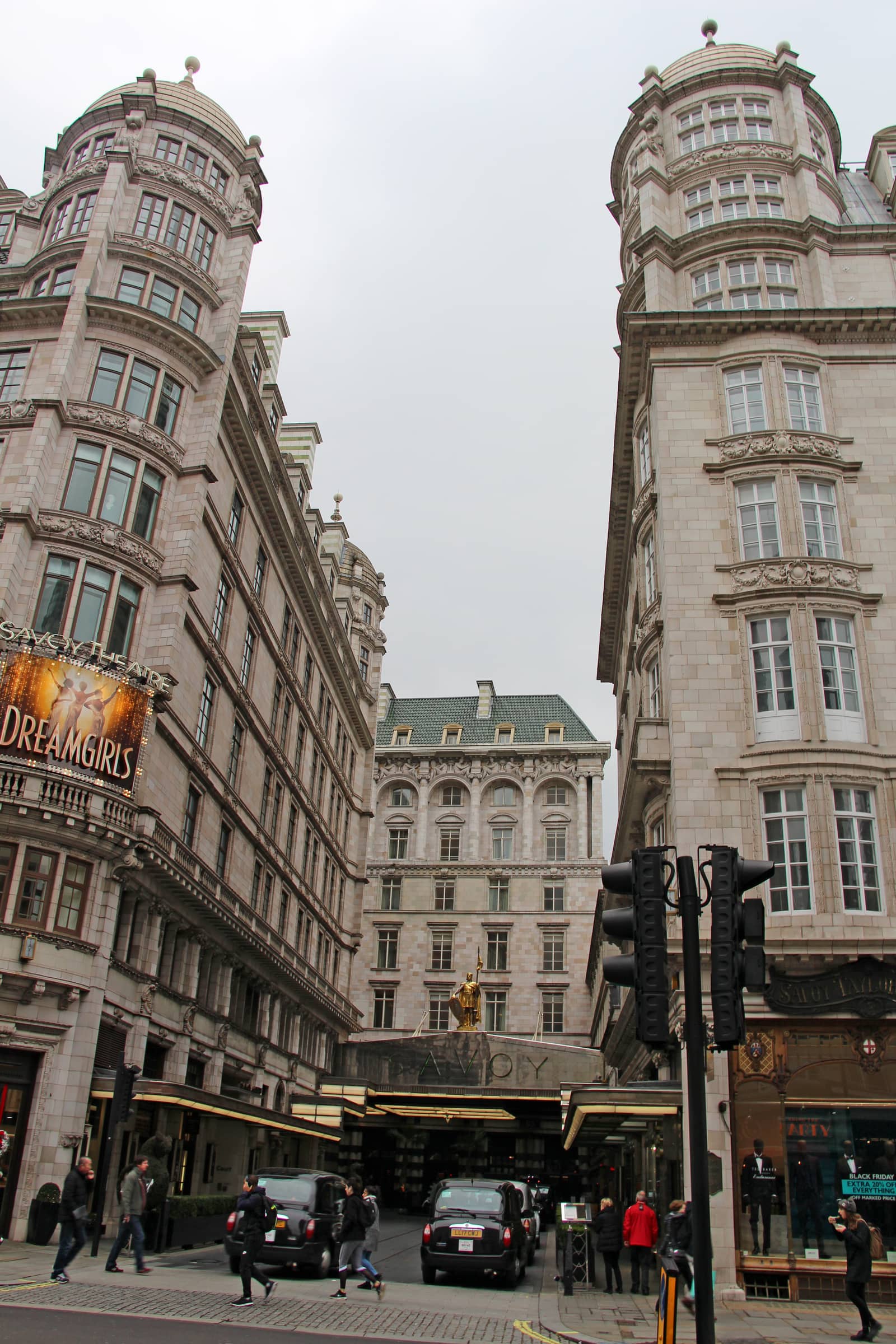 Savoy Court, the entrance court of the Savoy Hotel off the Strand, with the Savoy Theatre to the left.